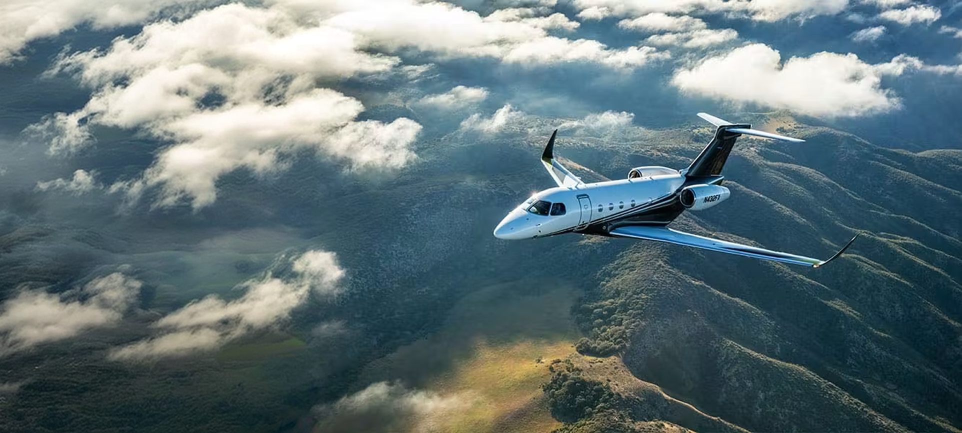 Midsize private jet in flight