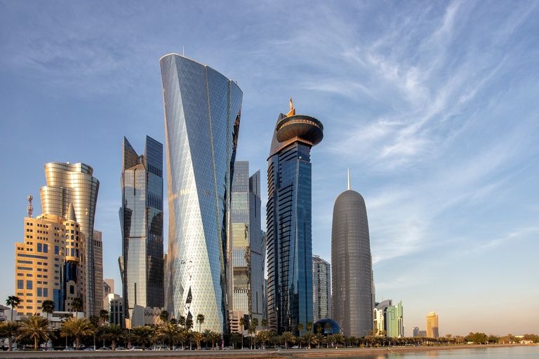 Doha's skyline of glass towers along the Corniche waterfront