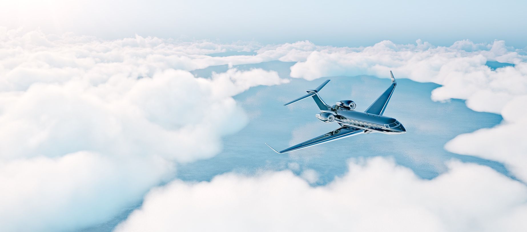 A private jet in flight above the clouds